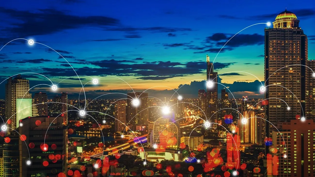 Vista aérea de uma cidade com áreas urbanas modernizadas e sustentáveis.